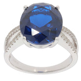 Oval blue sapphire sterling silver ring with accent, showcasing a dazzling gemstone for elegant style.